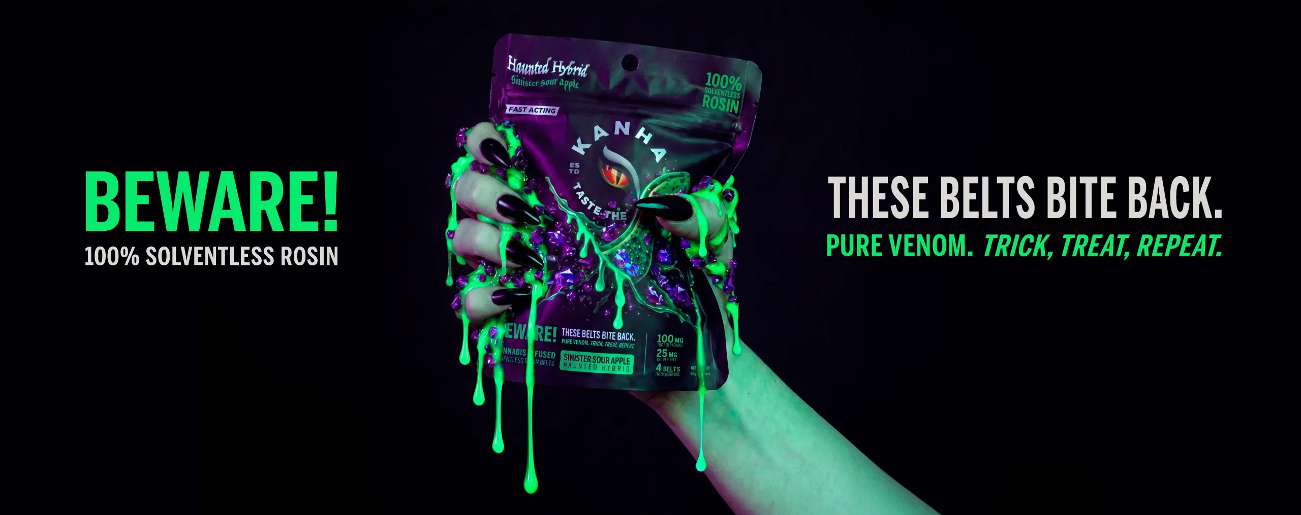 Hero banner for Kanha “Beware!” cannabis-infused solventless rosin belt gummies in Sinister Sour Apple Haunted Hybrid flavor. A hand with long black nails holds up the dark purple Halloween-themed package against a black background, with neon green slime dripping down over purple gem accents. Package details show 100mg total, 25mg per serving, 4 belts, fast acting, 100% solventless rosin. Text reads: “Beware! 100% Solventless Rosin. These Belts Bite Back. Pure Venom. Trick, Treat, Repeat.”